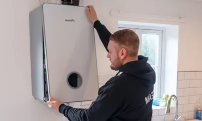 A Gas Safe engineer installing a boiler