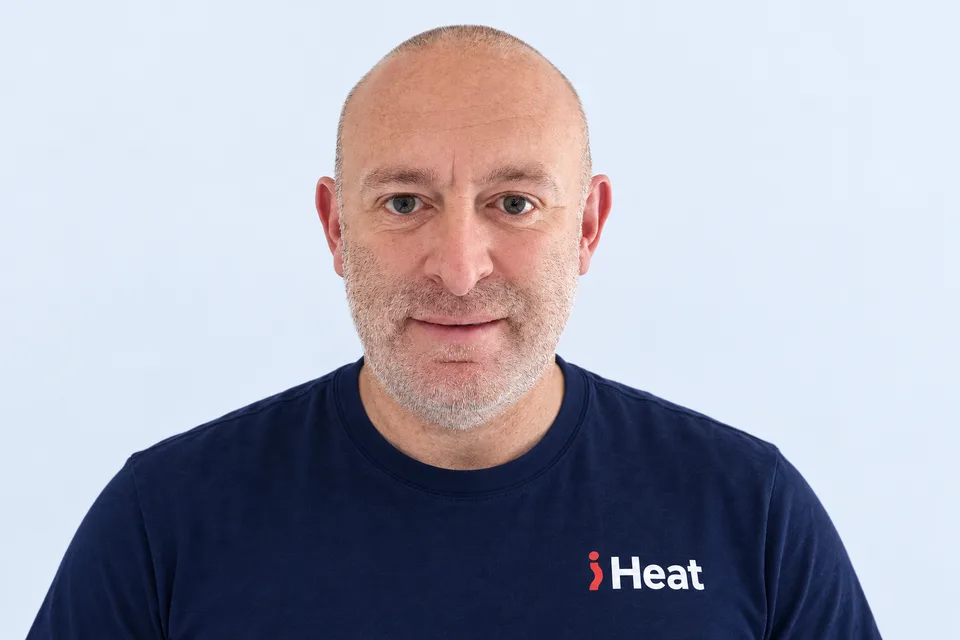 Lee, iHeat engineer, wearing a navy iHeat T-shirt