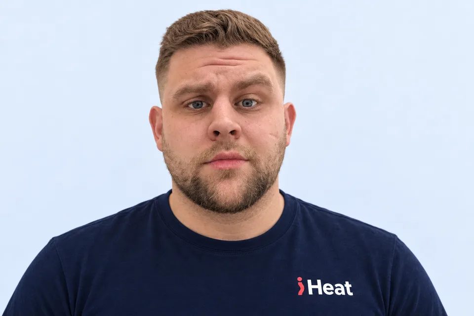 Benjamin, iHeat engineer, wearing a navy iHeat T-shirt