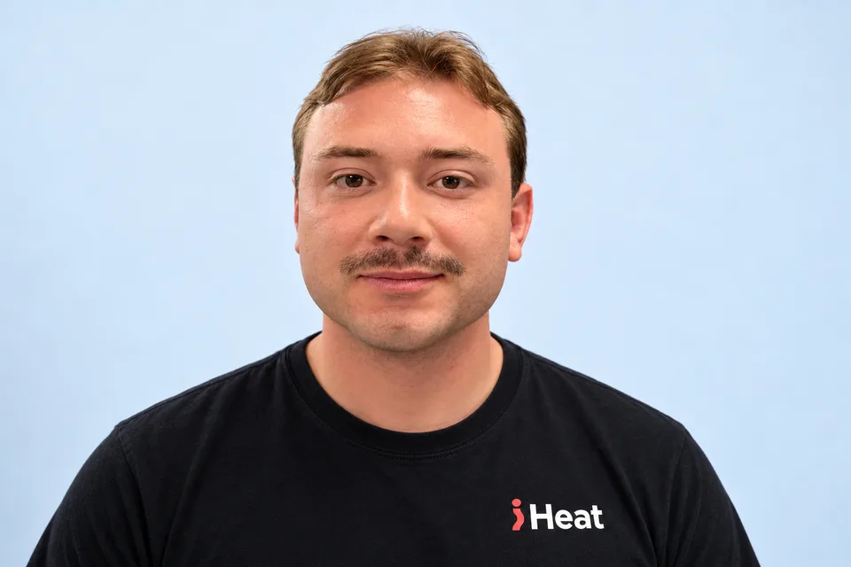 Callan Brown, iHeat in-house engineer, wearing a black iHeat T-shirt