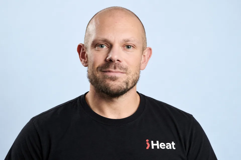 Stephen Day, iHeat in-house engineer, wearing a black iHeat T-shirt