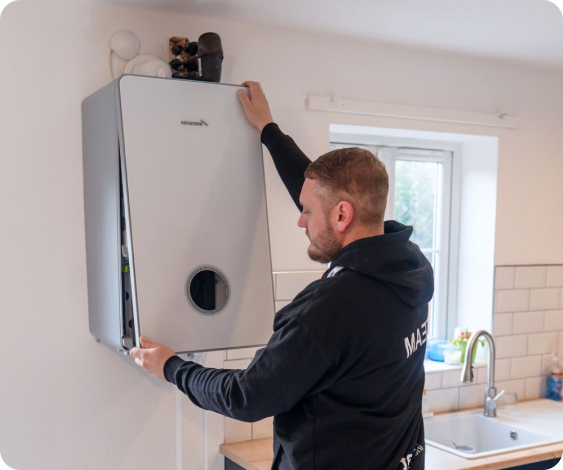 Gas Safe engineer installing boiler